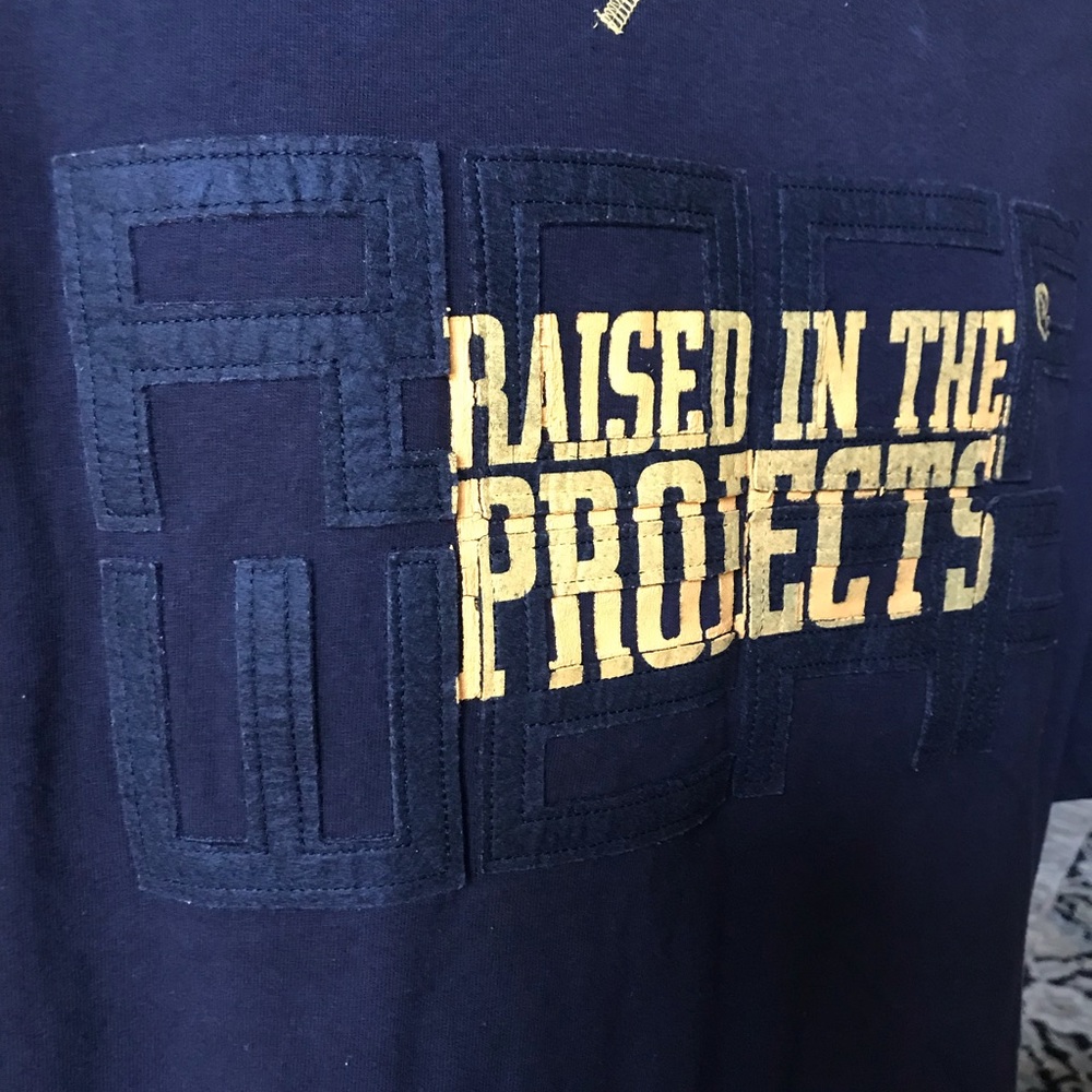 Roca Wear (2XL) RAISED IN THE PROJECTS T-Shirt - Picture 3 of 5